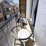 Family In The Centre Of Apartment
